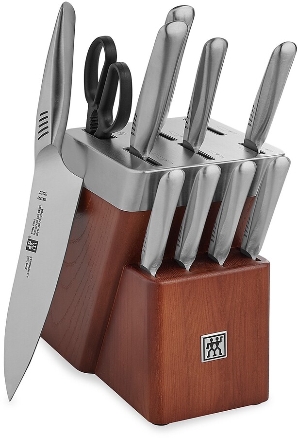 https://img.shopstyle-cdn.com/sim/61/4a/614a6d2dde56db0c69ae35f918d13209_best/twin-fin-ii-11-piece-self-sharpening-knife-block-set.jpg