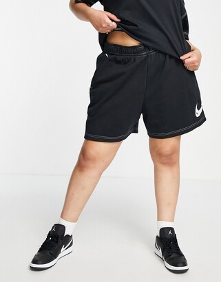 Nike Swoosh Plus contrast stitch fleece shorts in black