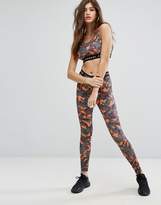 Thumbnail for your product : Criminal Damage Cropped Bralette Top With Tape Logo In Camo Print