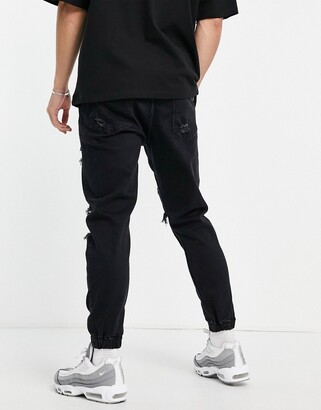 Bershka tapered jeans in washed black