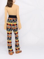 Thumbnail for your product : Palm Angels x Missoni side-stripe knitted trousers
