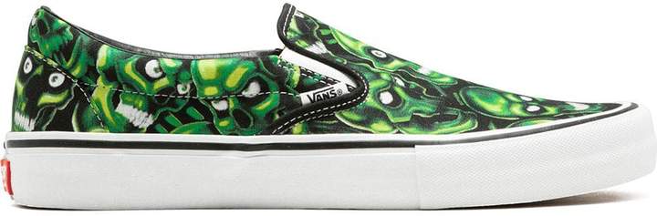 vans x supreme slip on