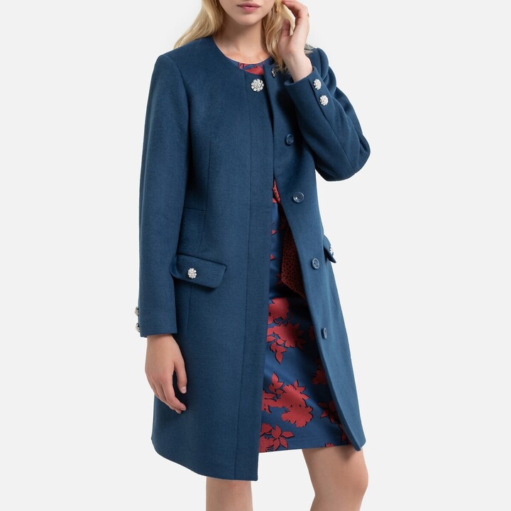 blue collarless coat