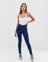Thumbnail for your product : ASOS Design DESIGN Ridley high waisted skinny jeans in deep blue wash