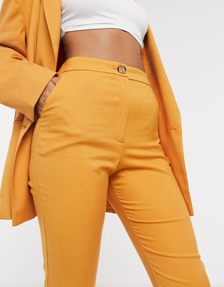 ASOS DESIGN slim suit pants in textured mustard