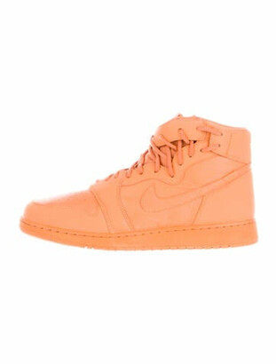 orange wedge sneakers