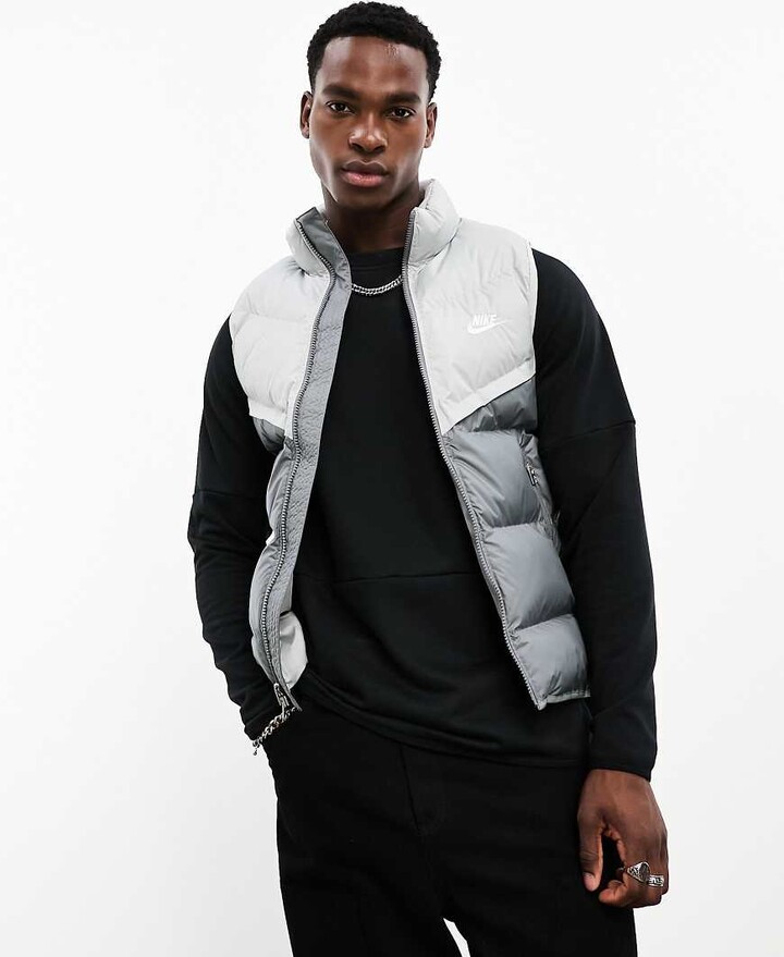 Nike Windrunner insulated gilet in grey ShopStyle Jackets