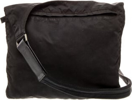 Prada Messenger Bag Nero Nappa Leather Tessuto Nylon & Enameled Metal Triangle Multitonal Hardware Leather Trim Single Shoulder Strap Leather Trim Embellishment & Single Exterior Pocket Nylon Lining & Single Interior Pocket Zip Closure at Top