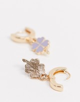Thumbnail for your product : ASOS DESIGN hoop earrings with four leaf clover charm in gold tone