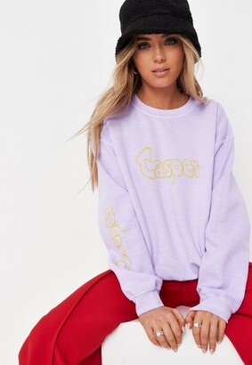 purple graphic sweater