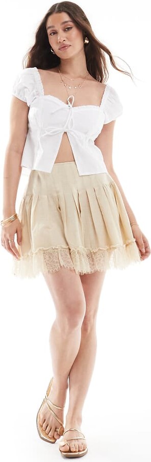 ASOS DESIGN laundered mini skirt with lace hem in cream ShopStyle
