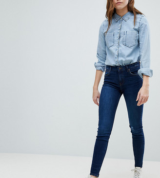 Bershka worn knee skinny jeans - ShopStyle