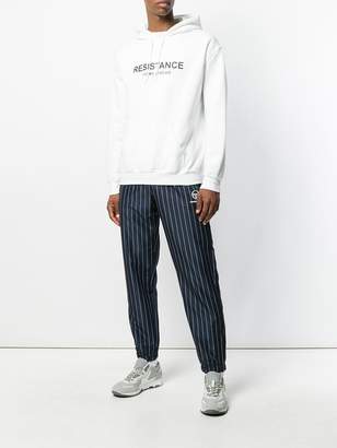 Andrea Crews striped track trousers