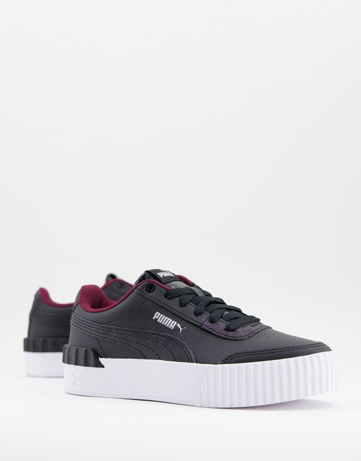 Puma Carina Lift Snake trainers in black - ShopStyle