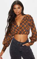 Thumbnail for your product : PrettyLittleThing Brown Check Plunge Elastic Hem Blouse