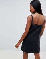 Thumbnail for your product : ASOS DESIGN denim button through slip dress in black with tortoiseshell buttons