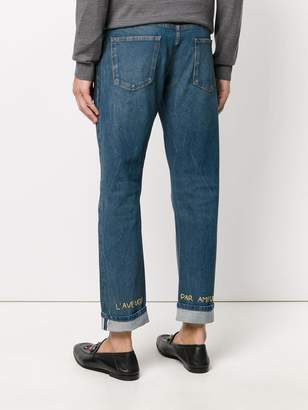 Gucci embroidered tapered jeans