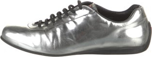 Prada Linea Rossa Vintage Low Top Sneakers Metallic & Silver Leather Rubber Trim Round-Toes Lace-Up Closure at Uppers Includes Dust Bag Unfortunately due to restrictions this item may not be eligible for shipping in all areas.