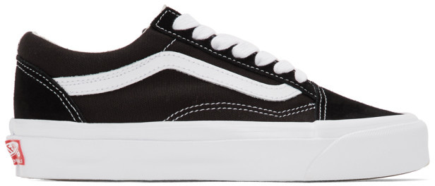 white leather vans with black stripe