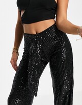 Thumbnail for your product : In The Style Petite Exclusive sequin wide leg pants with drape detail in black