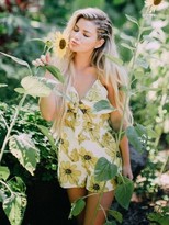 Thumbnail for your product : West Coast Wardrobe Sun Drenched Floral Romper in Yellow
