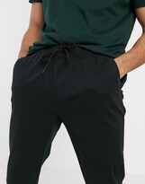 Thumbnail for your product : ASOS DESIGN skinny chinos with elastic waist in black