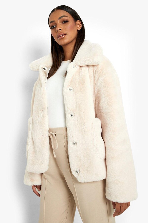 beige fluffy coat
