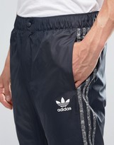 Thumbnail for your product : adidas Mix Logo Joggers In Grey Ay8363