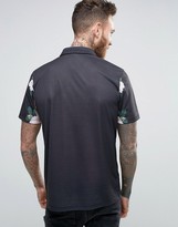 Thumbnail for your product : ASOS Polo Shirt With Floral Chest Detail