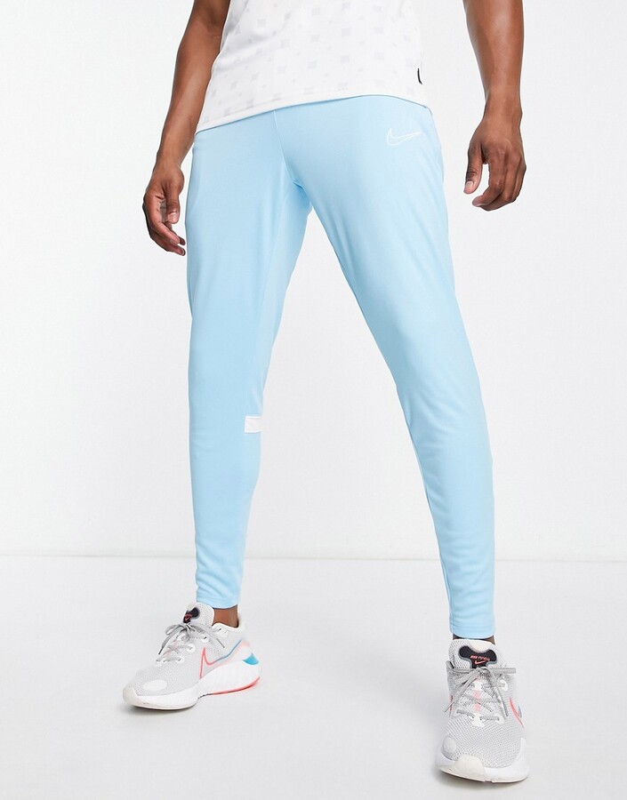 Nike Football Academy DriFIT joggers in light blue ShopStyle Trousers