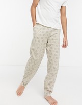 Thumbnail for your product : ASOS DESIGN lounge trousers with roman numeral print