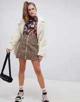 Thumbnail for your product : Monki leopard print zip front mini skirt in brown
