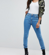 Thumbnail for your product : ASOS DESIGN Petite Ridley ankle grazer jeans in lightwash blue