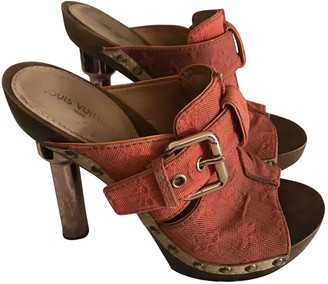 louis vuitton oak slip on clogs