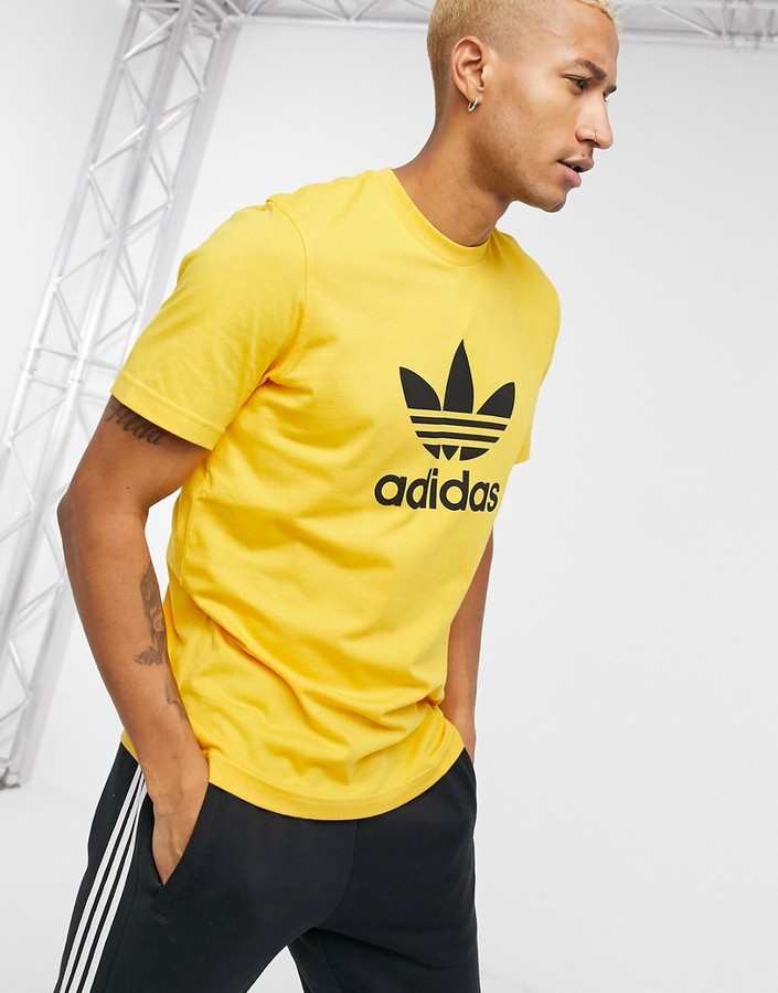 gold adidas shirt