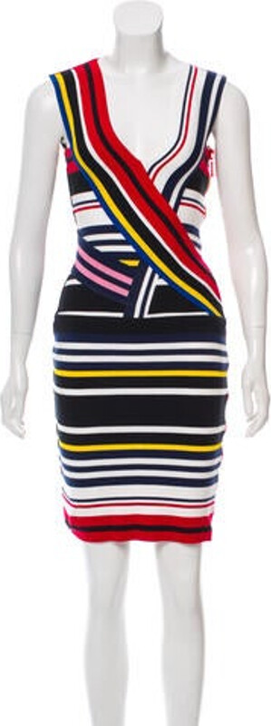 Preen by Thornton Bregazzi From the Spring 2015 Collection. Red and multicolor sleeveless mini dress with striped pattern throughout, V-neck and exposed zip closure at side. Designer