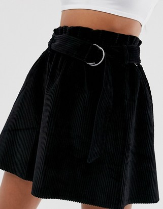 ASOS DESIGN cord mini skater skirt d rings in black