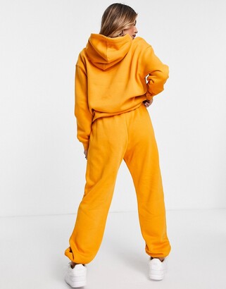 Nike mini swoosh oversized joggers in orange - ShopStyle Activewear Trousers