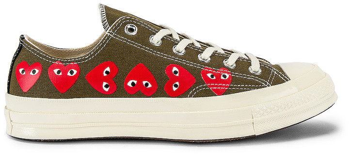 comme des garcons play emblem low top sneaker