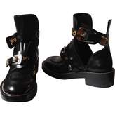 Patent Leather Buckled Boots 