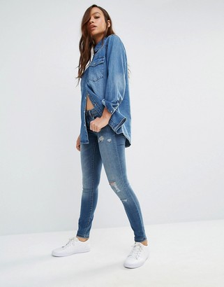 Blank NYC Mid Rise Skinny Jeans with Distresssing