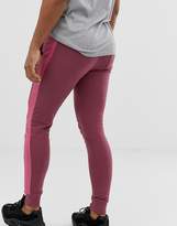 Thumbnail for your product : ASOS Design DESIGN skinny joggers with side stripe in purple