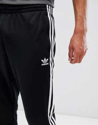 adidas Superstar Skinny joggers cuffed in black cw1275 - ShopStyle Trousers