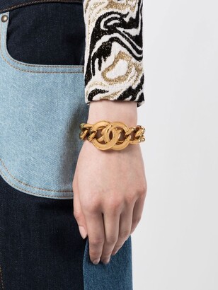 Chanel Pre-owned 2001 logo-lettering Bangle Bracelet - Gold