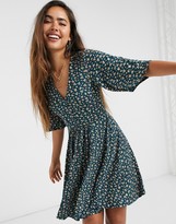 Thumbnail for your product : ASOS DESIGN mini swing dress in dark green floral print