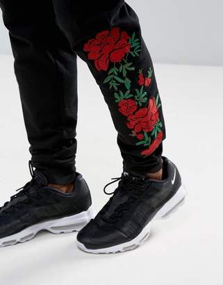 ASOS DESIGN Skinny Joggers with Rose Embroidery