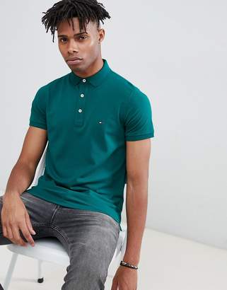 Tommy Hilfiger slim fit pique polo with flag logo in dark green