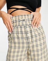Thumbnail for your product : Collusion longline shorts in check with waist band detail