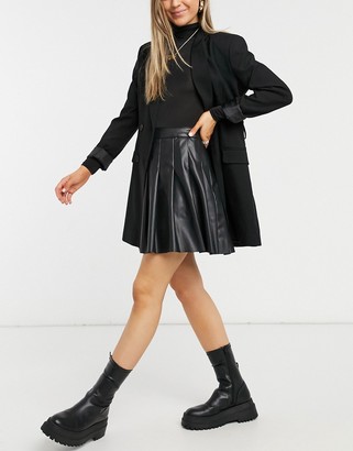 black pleated leather look skirt