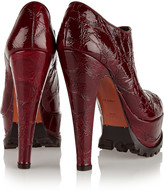 Thumbnail for your product : Alaia sold out Croc-effect patent leather ankle boots